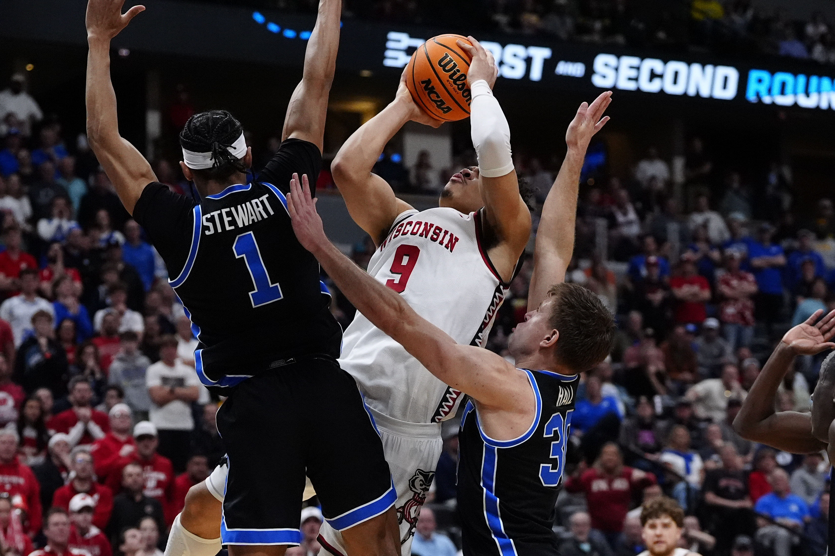 BYU Cougars versus Wisconsin Badgers during March Madness. - Source: Ron Chenoy, Imagn